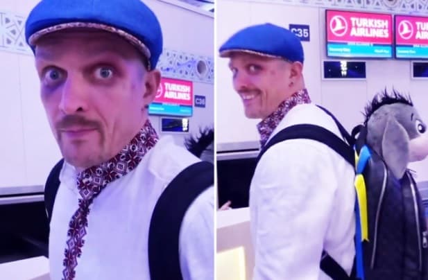 Usyk shfaqet në aeroport me sy të mavijosur dhe me lodrën që ia dha e bija (FOTO)
