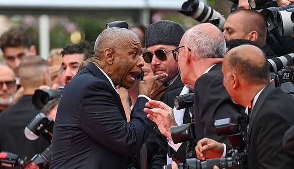 Denzel Washington zihet me një fotograf në Festivalin e Filmit në Kanë